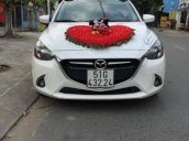 Cần bán Mazda 2 AT sản xuất 2017, màu trắng, xe nhà mình mua mới 7/2017