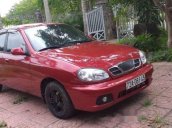 Cần bán xe Daewoo Lanos đời 2001, màu đỏ, xe đẹp không một vết trầy xước, máy êm