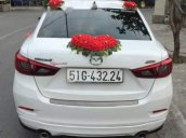 Cần bán Mazda 2 AT sản xuất 2017, màu trắng, xe nhà mình mua mới 7/2017