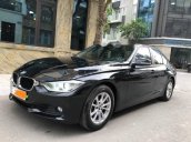 Bán BMW 320i sản xuất 2013, màu đen, nhập khẩu  