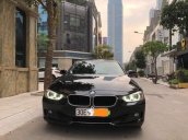 Bán BMW 320i sản xuất 2013, màu đen, nhập khẩu  