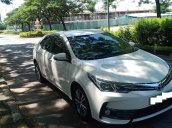 Bán Toyota Altis 1.8G năm 2018, màu trắng, xe sử dụng rất ít, bán 720 triệu