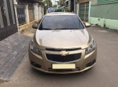 Gia đình cần bán Cruze 2010, số sàn, màu vàng cát