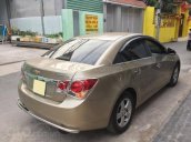 Gia đình cần bán Cruze 2010, số sàn, màu vàng cát