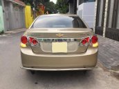 Gia đình cần bán Cruze 2010, số sàn, màu vàng cát