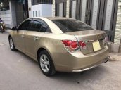 Gia đình cần bán Cruze 2010, số sàn, màu vàng cát