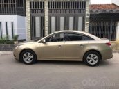 Gia đình cần bán Cruze 2010, số sàn, màu vàng cát