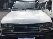 Bán Toyota Land Cruiser sản xuất 1996, màu trắng, nhập khẩu, 7 chỗ