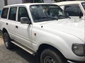 Bán Toyota Land Cruiser sản xuất 1996, màu trắng, nhập khẩu, 7 chỗ