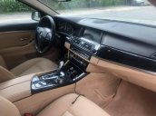 Chính chủ bán BMW 520i màu trắng kem SX 2015, cửa hít, màn NBT, loa Harman