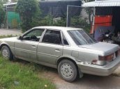 Cần bán gấp Toyota Camry 2.0 đời 1986, màu bạc, xe đang dùng tốt, nội thất dễ nhìn, hơi trầy