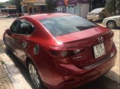 Bán Mazda 3 AT năm 2017, màu đỏ, có trầy xước và dặm nhẹ lại rồi