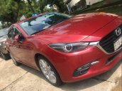 Bán Mazda 3 AT năm 2017, màu đỏ, có trầy xước và dặm nhẹ lại rồi