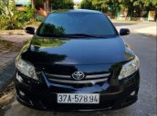 Cần bán lại xe Toyota Corolla altis G đời 2010, màu đen