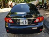 Cần bán lại xe Toyota Corolla altis G đời 2010, màu đen