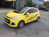 Bán ô tô Hyundai Grand i10 2015, màu vàng, xe đẹp, gầm bệ chắc chắn đã nên đồ chơi