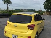 Bán ô tô Hyundai Grand i10 2015, màu vàng, xe đẹp, gầm bệ chắc chắn đã nên đồ chơi