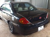 Cần bán xe Kia Spectra đời 2005, màu đen, giá tốt