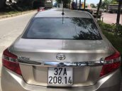 Bán Toyota Vios sản xuất năm 2015, màu vàng cát