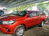 Chính chủ bán Toyota Hilux 2016, màu đỏ, nhập khẩu Thái Lan, giá chỉ 630 triệu