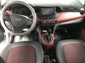 Bán Hyundai Grand I10 sedan 1.2AT màu trắng, số tự động, sản xuất 2017, đi đúng 11000km