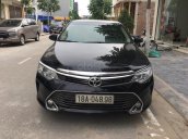 Cần bán xe Camry 2.0E, màu đen