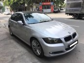 Gia đình cần bán BMW 320i đời 2009, số tự động, màu bạc