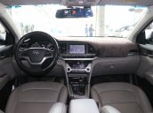 Cần bán Hyundai Elantra GLS 1.6 AT đời 2016, màu trắng, 566 triệu