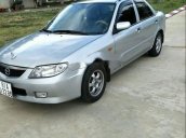 Cần bán lại xe Mazda 323 đời 2003, màu bạc