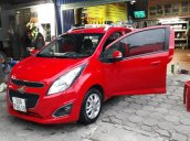 Lên đời xe nên cần bán Chevrolet Spark, số tự động, màu đỏ, sản xuất năm 2015