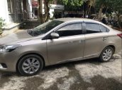 Cần bán xe Toyota Vios 1.5MT đời 2016, màu vàng cát