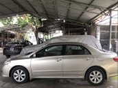 Bán lại xe Toyota Corolla altis 1.8G đời 2010, màu vàng cát