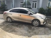 Cần bán xe Toyota Vios 1.5MT đời 2016, màu vàng cát