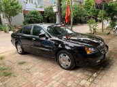 Cần bán lại xe cũ Daewoo Magnus năm 2004, màu đen