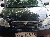 Gia đình bán Toyota Corolla altis sản xuất năm 2004, màu đen