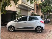 Bán ô tô Hyundai Grand i10 năm 2015, màu bạc, xe cực đẹp