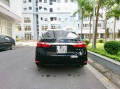 Bán ô tô Toyota Corolla altis 1.8G AT năm 2015, màu đen chính chủ, 630 triệu