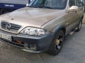 Bán Ssangyong Musso sản xuất năm 2003, màu vàng, 135 triệu