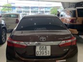 Cần bán xe Toyota Corolla altis 1.8G AT năm sản xuất 2016, xe chạy lướt 6.000 km, màu nâu, xe đẹp như mới