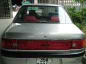 Bán xe Mazda 323 năm sản xuất 1996, màu bạc