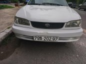 Cần bán xe Toyota Corolla 1999, màu trắng, xe mới đăng kiểm, gầm máy còn rất ok