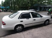 Cần bán xe Toyota Corolla 1999, màu trắng, xe mới đăng kiểm, gầm máy còn rất ok