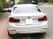 Bán xe BMW 3 Series 320i năm 2012, màu trắng, nhập khẩu biển TP. HCM