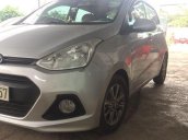 Cần bán gấp Hyundai Grand i10 đời 2015, màu bạc chính chủ