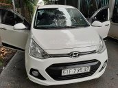 Bán Hyundai Grand i10 1.2 AT năm sản xuất 2016, màu trắng, nhập khẩu nguyên chiếc