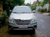 Bán Toyota Innova 2.0E đời 2014, màu bạc số sàn