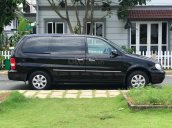 Cần bán xe Kia Carnival 2.5AT đời 2009, màu đen