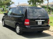 Cần bán xe Kia Carnival 2.5AT đời 2009, màu đen