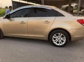 Cần bán xe Cruze 2015, số sàn, màu vàng cát, còn mới tinh