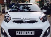 Bán xe Kia Picanto sản xuất 2014, màu trắng, ít đi, bảo dưỡng chính hãng định kì, không đâm đụng bơi lội